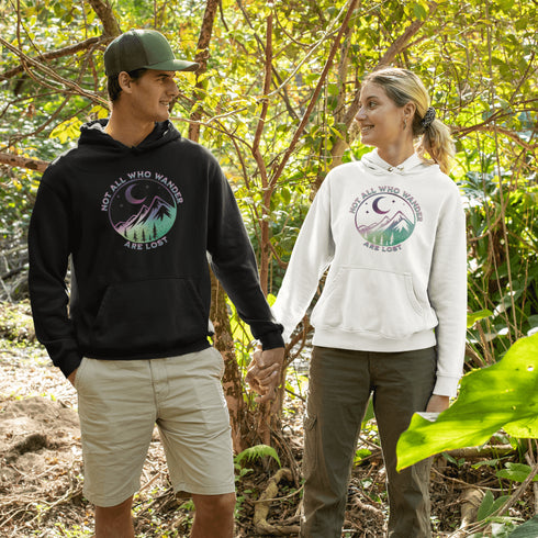 Introducing the perfect hoodie for your next outdoor adventure - our colorful mountain graphic hoodie that says "Not All Who Wander Are Lost".